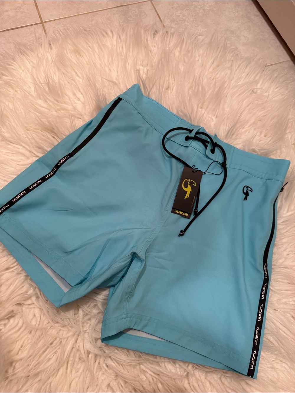Tucann Men's Turquoise Swim Trunks